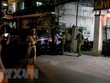 Dẫn giải một bị can sau khi bị khởi tố lên xe của Cơ quan Cảnh sát điều tra Bộ Công an. (Ảnh: Nguyễn Thanh/TTXVN).