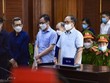 Các bị cáo tại phiên tòa sơ thẩm.