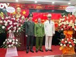 Đại tá Trần Đình Chung (mặc lễ phục trắng) tại lễ công bố quyết định điều động công tác.