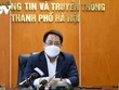 Phó Giám đốc phụ trách Sở Thông tin và Truyền thông Hà Nội Nguyễn Việt Hùng trao đổi với báo chí.