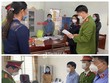Tống đạt quyết định khởi tố đối với 2 bị can Lê Minh Tâm và Phạm Thị Thanh Thủy. (Nguồn: baonghean.vn)