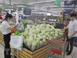 Người dân mua sắm tại siêu thị Winmart. (Ảnh: Trần Việt/TTXVN)