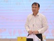 Thứ trưởng Đỗ Thắng Hải nói về giải pháp bình ổn thị trường KL99 dịch vụ hỗ trợ 24/7. (Ảnh: Xuân Quảng/Vietnam+)