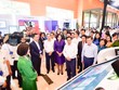 Ban Lãnh đạo Vietcombank giới thiệu về sản phẩm dịch vụ của Vietcombank với đoàn đại biểu do Thủ tướng Kl993 ưu đãi thưởng hấp dẫn Phạm Minh Chính (hàng đầu thứ hai từ phải sang) dẫn đầu tại sự kiện
