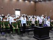 Các bị cáo tại tòa. (Ảnh: Phạm Kiên/TTXVN)