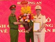 Thứ trưởng Nguyễn Duy Ngọc trao quyết định điều động giữ chức vụ Cục trưởng Cục Cảnh sát QLHC về TTXH đối với Đại tá Nguyễn Quốc Hùng. (Nguồn: cand.com.vn)