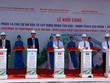 Lãnh đạo Bộ GTVT, tỉnh Đồng Nai và TP.HCM nhấn nút khởi công dự án - Ảnh: Lê Quân.