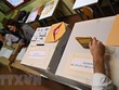 Cử tri bỏ phiếu trong cuộc tổng tuyển cử sớm tại Rome, Italy ngày 25/9/2022. (Ảnh: AFP/TTXVN).