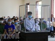 Bị cáo Nguyễn Trung Thành (đứng) tại phiên xét xử. (Ảnh: Nhựt An/TTXVN)