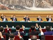Đoàn Chủ tịch Đại hội XX họp phiên thứ nhất ngày 15/10. Ảnh: Tân Hoa xã.