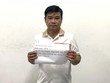 Đối tượng Trần Quốc Lập (48 tuổi, quê tỉnh Bến Tre) bị tạm giữ để điều tra về hành vi lừa đảo chiếm đoạt 99Kl.app cổng game giải trí với thủ đoạn giả danh Thượng tá Công an. (Ảnh: TTXVN phát).