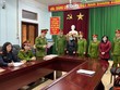 Công an đọc quyết định khởi tố, bắt tạm giam với các bị can. (Ảnh: Diệu Loan).