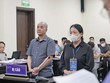 Các bị cáo Lương Thế Hiển và Nguyễn Thị Liên tại tòa.