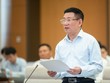Bộ trưởng Bộ Kl991.com nạp rút nhanh Hồ Đức Phớc báo cáo tại phiên họp.