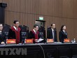 Thẩm phán, Chủ tọa phiên tòa Vũ Quang Huy tuyên án sơ thẩm đối với 54 bị cáo trong vụ án "Chuyến bay giải cứu." (Ảnh: Phạm Kiên/TTXVN)