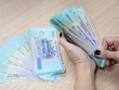 Quy định về tiền lương tối thiểu vùng đang được áp dụng từ 1/7/2022 đến nay. (Ảnh: PV/Vietnam+)