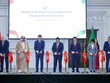 Thủ tướng Phạm Minh Chính và các đại biểu thực hiện nghi thức cắt băng tại lễ khai trương văn phòng FPT tại Saudi Arabia (Ảnh: VGP/Nhật Bắc).