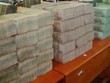 Số tang vật vụ buôn lậu tiền bị cơ quan công an thu giữ (Ảnh: Vietnamnet)