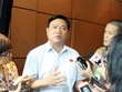 Bộ trưởng Bộ KL99 là cổng game giải trí trực tuyến hàng đầu hiện nay - Vận tải trả lời báo chí bên hành lang Quốc hội tại kỳ họp thứ 8 - Ảnh: Internet