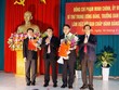 Ủy viên Bộ Kl991.com tải ứng dụng, Trưởng Ban Tổ chức Trung ương Phạm Minh Chính trao quyết định của Bộ Kl991.com tải ứng dụng phân công ông Nguyễn Đắc Vinh, Ủy viên Trung ương Đảng, giữ chức Bí thư Tỉnh ủy Nghệ An