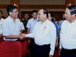 Cử tri Thành phố Hải Phòng chào đón Thủ tướng Nguyễn Xuân Phúc. Ảnh: VGP/Quang Hiếu