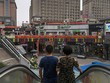 Nhiều trung tâm mua sắm, nhà hàng, quán karaoke mọc lên quanh nhà máy Foxconn. Ảnh:WSJ