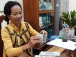 Bà Tuyết nhận trước 200 triệu đồng tiền trúng số độc đắc từ 6 năm trước. Ảnh:Dương Đông.