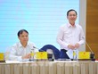 Phó Thống đốc Đào Minh Tú trả lời tại họp báo (Ảnh: TTXVN)