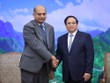 Thủ tướng Phạm Minh Chính và ông Karthik Rammohan, Phó Chủ tịch cấp cao Kl994 game bài casino hấp dẫn Lam Research (Hoa Kỳ). (Ảnh: Nhật Bắc)