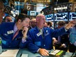 Phố Wall hồi phục trở lại trong phiên cuối tuần sau 5 phiên giảm liên tiếp - Ảnh: Reuters