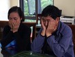 Vợ chồng Thanh - Tý khi bị bắt. Ảnh: Dân trí.