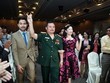 Bị can Lê Xuân Giang (ở giữa) tại một buổi hội thảo. Ảnh: Zing.