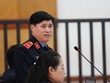 Đại diện VKS đối đáp tại tòa. 