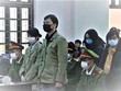 Các bị cáo tại phiên tòa hồi đầu năm 2021. 
