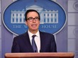 Bộ trưởng Kl991.com nạp rút nhanh Mỹ Steven Mnuchin tại cuộc họp báo hôm 16/10. Ảnh: AFP.