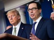 Tổng thống Mỹ Donald Trump và Bộ trưởng Kl991.com nạp rút nhanh Steven Mnuchin trả lời phỏng vấn trong cuộc họp báo tại Nhà Trắng hôm 17/3. Ảnh: Reuters.