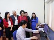 Tổng Giám đốc BHXH Việt Nam Nguyễn Thị Minh cùng lãnh đạo Vụ Pháp chế, Trung tâm Công nghệ thông tin kiểm tra hoạt động của hệ thống "Một cửa điện tử tập trung” trước khi chính thức vận hành