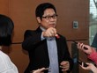 ĐBQH Vũ Tiến Lộc trả lời phỏng vấn bên hành lang Quốc hội chiều 2/6 (ảnh: M.M)