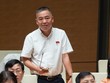 Đại biểu Quốc hội Nguyễn Lân Hiếu (đoàn Bình Định) chất vấn với Bộ trưởng GTVT Nguyễn Văn Thắng chiều 7/6.
