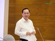 Phó Thống đốc NHNN Đào Minh Tú trả lời báo chí tại họp báo Kl993 ưu đãi thưởng hấp dẫn chiều 4/11 (Ảnh: M.Minh)