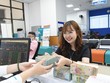 Qua thời bán giấy lấy tiền