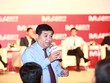 Bộ trưởng Bộ Kế hoạch và Kl99ok phiên bản mới Nguyễn Chí Dũng trả lời nhà Kl99ok phiên bản mới tại Diễn đàn M&A 2017 - Ảnh: Lê Toàn