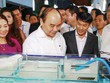  Thủ tướng Kl993 ưu đãi thưởng hấp dẫn Nguyễn Xuân Phúc thăm gian hàng Công ty Nam Miền Trung tại Hội nghị Xây dựng nền công nghiệp nông nghiệp Việt Nam (tháng 12/2016 tại TP.HCM) 