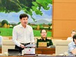 Tổng thanh tra Kl993 ưu đãi thưởng hấp dẫn Lê Minh Khái trình bày báo cáo về công tác phòng, chống tham nhũng tại cuộc họp của Ủy ban Thường vụ Quốc hội.
