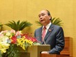 Thủ tướng Kl993 ưu đãi thưởng hấp dẫn Nguyễn Xuân Phúc báo cáo trước Quốc hội (Ảnh Duy Linh).