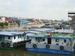 Sà lan vận chuyển hàng hóa trên một tuyến kênh đào khu vực Đồng bằng sông Cửu Long