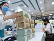 Người dân vẫn ưu tiên lựa chọn gửi tiết kiệm kỳ hạn ngắn. Ảnh: Dũng Minh