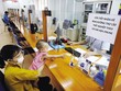 Hỗ trợ người dân bị ảnh hưởng bởi Covid-19. Ảnh: Đức Thanh
