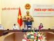 Chủ tịch Quốc hội, Chủ tịch Hội đồng Bầu cử quốc gia Vương Đình Huệ chủ trì phiên họp (Ảnh TTXVN).