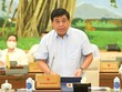 Bộ trưởng Bộ Kế hoạch và Kl99ok phiên bản mới Nguyễn Chí Dũng trình bày báo cáo.